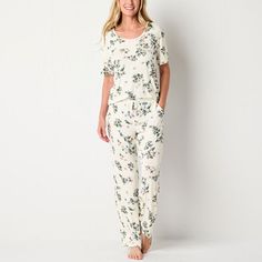 You'll love adding this Liz Claiborne women's Cool and Calm 2-piece pajama set to your wind-down routine. It's made from pointelle fabric with breathable, temperature-regulating, and moisture-wicking fibers to activate cooling all night. It includes a scoop neck short-sleeve top and matching pants with an elastic-drawstring waistband and two side slip pockets. # Pieces In Set: 21st Piece Description: Top1st Piece Apparel Length: 25.5 Inches1st Piece Fabric: Knit1st Piece Fiber Content: 97% Rayon Pajama Set White, Pointelle Fabric, Matching Pants, Pajama Sets, Drawstring Waistband, Liz Claiborne, 2 Piece, Pajama Set, Moisture Wicking