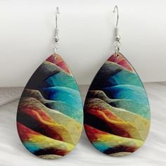 Earrings Bohemian Colorful Gradient Pattern Print Teal/Orange Water Drop Pierced New About 1.25"X 2", Not Including The Hook Lightweight, Non Flexible. They Remind Me Of Abstract Mountains. New In Package Trendy Multicolor Teardrop Jewelry, Multicolor Dangle Teardrop Earrings As Gift, Multicolor Dangle Teardrop Earrings For Gift, Multicolor Teardrop Jewelry For Beach, Orange Teardrop Earrings For Festival, Orange Teardrop Jewelry For Festivals, Artistic Multicolor Beach Jewelry, Artistic Multicolor Summer Jewelry, Multicolor Dangle Teardrop Earrings For Summer