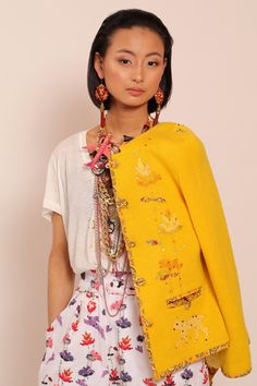 Yellow wool jacket with floral embroidery and natural silk lining. Embellished with Swarovski crystals. Each jacket is hand embroidered and one of a kind. Collection "MOON [mo:n]" is inspired by floral embroidery from Muhu, a small island in Estonia with great handicraft traditions.  Each flower, bird and animal embroidered on the jacket has their own symbolic meaning. This jacket will be made especially for you and according to your measurements. Please allow 2-4  weeks for creating it. We ship Luxury Spring Outerwear With Floral Embroidery, Spring Wool Outerwear With Embroidery, Spring Wool Cardigan With Embroidery, Traditional Embellished Spring Outerwear, Spring Embroidered Wool Cardigan, Wrap Jacket, Flower Bird, Small Island, Natural Silk