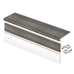 the side profile of a white and gray laminate skirting board with an arrow pointing up