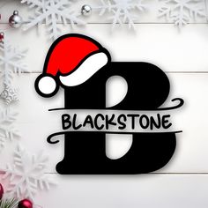 the letter b is for blackstone with a santa hat on it, surrounded by snowflakes