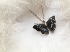 Midnight Black Pendant with Silk Butterfly Wings! :)Do you remember the first time when a butterfly sat on you? :) If not you must feel it in your free time in some butterfly garden! :) It inspired me when I was making this butterfly It will add to your look a touch of nature, the butterfly will flutter on you as it's a real one :)The butterfly is made manually of natural silk. Using multiple levels gives an unusual flickering 3D effect.Due to properties of natural silk wings are light and trans Wing-shaped Black Jewelry Gift, Black Wing-shaped Jewelry Gift, Wing-shaped Black Jewelry For Gifts, Black Wing-shaped Jewelry For Gifts, Gift Black Jewelry With Wing-shaped Pendant, Elegant Black Butterfly Charm Necklace, Black Butterfly-shaped Jewelry For Gift, Black Butterfly Charm Jewelry, Black Butterfly Jewelry For Gift