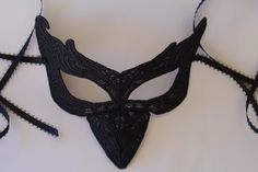 This is the lastest collection to my shop from all the different designs that I have, in large variety in colors and shapes. This mask is perfect for Halloween costumes, comicon and all the fun occasions. This mask like all my all my masks in the shop is very comfortable to wear for the long hours of the occasions. I made this solid black but if you wish this mask in a different color I can definitely change it, that's no problem I'm available anytime so please contact me. I also have one that h Handmade Masquerade Mask For Halloween Cosplay, Handmade Fantasy Halloween Mask, Handmade Halloween Festival Masquerade Mask, Handmade Fantasy Masquerade Mask For Costume Party, Halloween Festival Masquerade Eye Mask, Halloween Festival Eye Mask Masquerade, Handmade Masquerade Mask For Halloween Carnival, Handmade Masquerade Mask For Carnival Halloween, Fantasy Style Costume Eye Mask