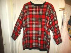 This is an 80s/90s mohair/acrylic blend knit, red and black plaid pullover sweater by Paul Harris Design. The sweater has a fuzzy finish, crew neckline, shoulder pads, and black ribbed knit narrow edge collar, cuffs and waist.     The sweater is in good condition with minor wear and no other problems to note. Tagged L Chest - 50 inches around the underarms Length - 30 1/2 inches down the front which is the shortest side. Sleeves - 33 inches from center back, across the shoulder to the end of the sleeve. 824 Plaid Long Sleeve Winter Sweater, Plaid Wool Tops For Winter, Winter Wool Plaid Tops, Fitted Plaid Long Sleeve Sweater, Oversized Plaid Sweater For Winter, Fitted Long Sleeve Plaid Sweater, Cozy Plaid Winter Tops, Plaid Wool Sweater For Winter, Plaid Crew Neck Sweater For Fall