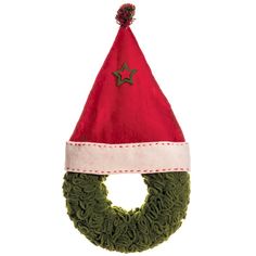 a green wreath with a red santa hat on it and a star decoration hanging from the top