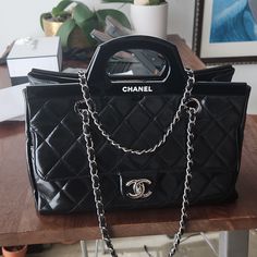 Vintage Chanel Bag. High-end Luxury Tote Bag, Luxury Double Handle Shoulder Bag For Everyday, Designer Handheld Bags For Everyday Luxury, Luxury Satchel With Removable Pouch, High-end Black Satchel For Shopping, High-end Black Shopping Bags, Luxury Black Satchel For Shopping, Luxe Black Travel Bag, Luxury Double Handle Shoulder Bag