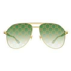 Introducing the luxurious Gucci GG1220S 004 Gold/Green with Pattern sunglasses, a must-have accessory for the modern man with an eye for high fashion. Crafted from the finest metal materials, these Aviator-style frames exude sophistication and style. The striking gold frame effortlessly complements the vibrant green lenses with a unique pattern, creating a bold and statement-making look. The oversized lens socket width of 59 and the bridge size of 14 ensure a comfortable and secure fit for all-day wear. Designed with precision and attention to detail, these Gucci sunglasses feature the iconic Gucci logo on the temples, showcasing the brand's heritage and status as a leader in luxury fashion. The temple length of 145 adds a touch of elegance to the overall design, making these sunglasses an Luxury Green Sunglasses With Uv Protection, Designer Gold Aviator Sunglasses With Uv Protection, Luxury Green Sunglasses With Gradient Lenses, Luxury Green Sunglasses With Mirrored Lenses, Luxury Aviator Sunglasses With Gradient Lenses For Summer, Gucci Designer Aviator Sunglasses With Tinted Lenses, Luxury Aviator Sunglasses With Mirrored Lenses, Elegant Green Gucci Sunglasses, Gucci Gold Tinted Aviator Sunglasses