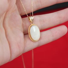 "Real Mother of Pearl Necklace 14k Gold Raw White Nacre Oval Necklace Vintage Style Boho Necklace Handmade Jewelry Christmas Gift For Women ▶ 𝙋𝙍𝙊𝘿𝙐𝘾𝙏 𝙁𝙀𝘼𝙏𝙐𝙍𝙀𝙎 * 14k Yellow Gold Mother of Pearl Necklace * Mother of Pearl Width : 1.23 cm ( 0.48 in) * Mother of Pearl Lenght : 1.75 cm ( 0.68 in) * Mother of Pearl Necklace Total Size : 1.55 cm x 2.38 cm ( 0.61 x 0.93 in) * Mother of Pearl Necklace Height: 4.95 mm ( 0.19 in) * Available in 5 different chain lengths: 42cm (16.5 in), 44cm Gold Oval Mother Of Pearl Necklace, Gold Oval Necklace With Mother Of Pearl, Oval Mother Of Pearl Gold Necklace, White Gold Oval Cabochon Necklace Gift, Oval Mother Of Pearl Necklace, White Oval Necklace With Polished Finish, White Oval Pendant Necklace With Polished Finish, Elegant 14k Gold Oval Cabochon Necklace, Polished Finish Oval Cabochon Necklace