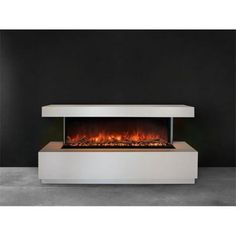 an electric fireplace with flames on the side and black background, in a modern living room