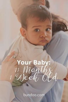 a woman holding a baby in her arms with the words, your baby months 1 week old