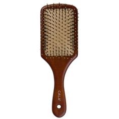 Dark Bamboo Paddle Hair Brush (Large) by Cala. CALA's Dark Bamboo Paddle Hair Brush is the ideal, eco-friendly way to smooth and straighten your hair. Each brush has a flexible cushion base for soft brushing, and the bristles help to massage the scalp, increasing blood circulation and improving the overall health and appearance of your hair. Hair Type: All Hair TypesHair Texture: Light, Medium, ThickHair Concerns: Straightening, and Smoothing Key Features Gently detangles wet or dry hair Ideal f Bamboo Hair Brush, Detangle Hair, Hair Detangler, Overall Health, Wet Hair, Blood Circulation, Thick Hair, Dry Hair, Hair Brush