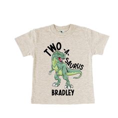 Dinosaur themed Birthday Shirt Green T-shirt With Dinosaur Print For Birthday, Birthday Dinosaur Print Short Sleeve T-shirt, Birthday T-shirt With Dinosaur Print, Green Dinosaur Print T-shirt For Birthday, Dinosaur Print Short Sleeve T-shirt For Birthday, Birthday Dinosaur Print Short Sleeve Top, Dinosaur Print Short Sleeve Top For Birthday, First Birthday T-shirt With Dinosaur Print, Dinosaur Print Short Sleeve T-shirt For First Birthday