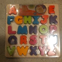 the letters and numbers are shaped like magnets