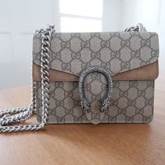 I Want To Be As Transparent As Possible On All Of My Items, Because That's What I Expect In Return. So No Bs From Me :) No Trades Please! Dionysus Gg Supreme Mini Bag Msrp $2,500 Size - Mini Color - Taupe/Tan Elevate Your Style With This Stunning Nwot Gucci Dionysus Gg Supreme Mini Bag In Taupe Suede. This Elegant Piece Is Crafted In Italy With High-Quality Canvas And Suede Materials. It Features A Beautiful Tiger Head Pin Closure And A Chain-Link Strap That Can Be Adjusted To Your Desired Lengt Luxury Gucci Bag With Horsebit Detail, Gucci Bags With Chain Strap For Gift, Gucci Top Handle Bag As Gift, Beautiful Tiger, Tiger Head, Head Pins, Suede Material, I Want To Be, Gucci Dionysus