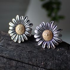 sterling silver mixed metal daisy flower stud post earrings Sterling Silver Flower Charm Earrings For Everyday, Sterling Silver Earrings With Flower Charm For Everyday, Nickel-free Daisy Flower Earrings Gift, Nickel-free Daisy Earrings For Gifts, Daisy Studs, Daisy Earrings, Mixed Metals, Earring Backs, Sterling Silver Earrings