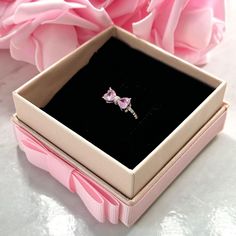 Our beautiful feminine "Pink Bow" ring is one of our Valentine's exclusive rings, delicately crafted to capture the beauty of femininity, this stunning ring is the perfect marriage between elegance and luxury. ♡ Size: Different sizes available♡ Material: Authentic S925 Sterling Silver♡ All of our jewelry are waterproof, tarnish-free and hypoallergenic. Very high-quality, made to last. Pink Promise Ring, The Perfect Marriage, Xmas Wishlist, Bow Ring, Perfect Marriage, November 13, Jewelry Diamonds, Gold Collection, Pink Bow