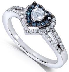 a white gold ring with blue and white diamonds