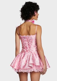 cuz what have you been up to? This mini dress has a non-stretch taffeta construction, a floral and pearl print all over, adjustable shoulder ties, lace and embroidered floral trim, structured boning, bow appliques, ruffled side insets, and adjustable back satin lace-up ties. Flirty Fitted Dress With Bow Straps, Pink Lace Trim Corset Dress For Party, Spring Mini Dress With Bow And Fitted Bodice, Pink Sleeveless Corset Dress With Lace Trim, Fitted Bodice Mini Dress With Bow For Spring, Floral Print Satin Mini Dress, Pink Coquette Dress For Spring, Spring Mini Length Coquette Dress, Spring Mini Length Flirty Dress