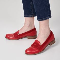 Introducing our latest statement piece: fashionable loafers in a vibrant red leather with delicate suede accents. The mix of textures, from smooth leather to velvety suede, creates a striking yet refined aesthetic. With their sleek silhouette and comfortable fit, these loafers offer both fashion-forward flair and all-day comfort. Pair them with monochrome or minimalistic outfits to let the shoes shine as the focal point. Not ready for bold, eye-catching outfits? Customize this model in classic b Red Flat Slip-ons With Leather Sole, Red Slip-on Flats With Flat Heel, Spring Loafers With Red Sole And Closed Toe, Slip-on Flat Loafers With Red Sole, Classic Loafers With Red Sole, Red Leather Shoes With Rubber Sole For Fall, Classic Red Flat Loafers, Slip-on Loafers With Red Sole, Red Flat Leather Shoes For Spring