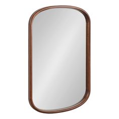 a mirror that is made out of wood and has an oval frame on the side