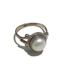 Size 7 Stone:  fresh water pearl  Metal: Sterling Silver (92.5) Pearl *         Bestows a calming reflection *         Provides purity *         Balances emotions Classic Adjustable Pearl White Pearl Ring, Classic Adjustable Oval Pearl Ring, Adjustable Pearl Drop Round Rings, Classic Adjustable White Moonstone Ring, Fresh Water Pearl Ring, Freshwater Pearl Ring, Fresh Water Pearl, Ring Silver, Silver Jewellery