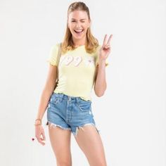 Brand New With Tags Women’s Size: Xxs Color: Yellow Obsessed With The 90s, So Are We! This Fitted Knit Tee Features A Crew Neckline, Short Sleeves, Lettuce-Edge Detailing, And 1990 In A Retro Graphic. It Pairs Perfectly With Denim Shorts And Sandals For A Laid-Back Look! Y2k Short Sleeve Spring Tops, Y2k Short Sleeve Tops For Spring, Y2k Style Short Sleeve Tops For Spring, 90s Inspired Summer T-shirt With Letter Print, Y2k Crew Neck Spring Top, Spring Y2k Crew Neck Top, Y2k Crew Neck Top For Spring, Fitted 90s Inspired Summer Tops, Fitted 90s Style Summer Tops