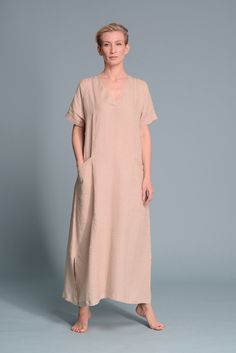 "🌿 ITEM DESCRIPTION Lightweight linen kaftan dress MIDBAR is a very comfy basic summer dress - very light and airy. Loose fit, long, middle east style galabia. Can be a little see trough in light colors. - Made-to-measure - V neckline - Short sleeves - A-line design - Relaxed fit - 2 Side pockets - 100% Natural Linen in lightweight - Wide color palette, color shown: BEIGE - Custom length and size EACH ITEM IS MADE-TO-MEASURE TO FIT YOUR BODY, SO PLEASE LEAVE ME A NOTE WITH YOUR MEASUREMENTS, HE Long Linen Kaftan, Elegant Linen Kaftan For Summer, Linen Kaftan For Daywear, Basic Summer Dress, Linen Kaftan Dress, Linen Dress Short, Middle East Style, Linen Kaftan, Linen Tunic Dress