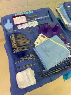 medical supplies are laid out on a blue table