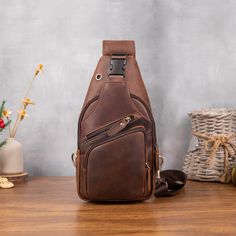 Crazy Horse Leather Chest Bag for Men's Leisure Retro Style Crossbody Bag Top Layer Cowhide Shoulder Bag Commuter Outdoor Leisure Bag PRODUCT INFORMATION --------------------------------------------- --Product Size: 34x9x17 cm--13.38x6.69x3.54 inch; --Item Weight:0.6 kg/1.32lb --Color: Deep Brown --High-Quality Stitching This bag has an adjustable shoulder strap. On the back of the crossbody bag are two hooks for both the left and right shoulders ✔The ultimate grab-and-go daypack, this brown lea Outdoor Brown Bag With Anti-theft Pocket, Brown Outdoor Bags With Anti-theft Pocket, Outdoor Large Capacity Brown Chest Bag, Brown Crossbody Chest Bag For Outdoor, Brown Chest Bag With Zipper For Outdoor, Brown Chest Bag With Zipper Pocket For Outdoor, Outdoor Chest Bag With Adjustable Strap, Outdoor Brown Chest Bag With Adjustable Strap, Durable Travel Chest Bag Backpack Style