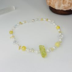 enhance your fairy cottage core aesthetic with this stunning yellow jade crystal necklace. The perfect spiritual protection gift. I try to ship out within 48 hours, all items are pre-made and ready to be shipped. Materials: -Wire -star beads -yellow jade -citrine chips -pearls  Sizing: when it comes to sizing with all my products some with come with extensions and if not are only available in the size made. This necklace is about 14 in long. I take pride in my work and pay close attention to det Yellow Crystal Necklaces For Gift, Spiritual Yellow Citrine Necklace, Yellow Crystal Gemstone Bead Necklace For Gifts, Yellow Gemstone Beads For Jewelry Making, Yellow Beaded Crystal Necklace For Gift, Fairy Cottage Core Aesthetic, Jade Crystal Necklace, Yellow Jade Crystal, Wire Star