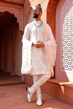 Ivory kurta with embroidered floral jaal patterns. Comes with churidar and embroidered dupatta. - Aza Fashions Semi-stitched Chanderi Sherwani With Cutdana, Wedding Kurta With Gota Work In Jamawar, Ceremonial Raw Silk Kurta With Cutdana, Festive Unstitched Sherwani With Gota Work, Festive Semi-stitched Sherwani With Gota Work, Ceremonial Chanderi Kurta With Cutdana, Traditional Drape Chanderi Sherwani For Wedding, Eid Sherwani With Gota Work In Chanderi, Diwali Jamawar Kurta With Gota Work