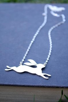 I made the original of this rabbit necklace for myself to symbolize 2011's Year of the Rabbit - which was the year I changed my life & opened Lola&Cash  ❤ I love how the slender rabbit run's free, with long ears flapping in the wind.. it's a reminder of breaking free from the corporate world to pursue something I love, so I wear this as my lucky rabbit charm!— d e t a i l s —-lucky rabbit measures 4cm wide-hand sawn out of sterling silver-completed in a mirror finish-includes a 45cm silv Rabbit Necklace, Rabbit Jewelry, Rabbit Run, Bunny Necklace, Zodiac Calendar, Rabbit Charm, Rabbit Necklaces, Rabbit Pendant, Lucky Rabbit