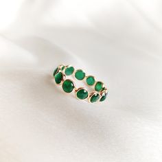 This stunning ring is set in 14k Solid Yellow Gold with Natural Emerald with utmost precision. It is an unique dainty gemstone ring for nearly every occasion and is completely hassle-free jewelry. 🔷ABOUT GEMSTONE:  Emerald is often associated with love and romantic relationships. It is believed to promote love, loyalty, and unity, making it a popular choice for engagement and anniversary jewelry. Emerald is often associated with abundance and financial success. It is believed to attract prosper Elegant Stackable Emerald Rings With Bezel Setting, Elegant Green Stackable Rings With Bezel Setting, Elegant Emerald Ring With Smooth Bezel For Anniversary, Green Jewelry With Bezel Setting And Round Band, Emerald Jewelry With Bezel Setting In Round Band, Adjustable Emerald Ring With Bezel Setting, Green Halo Jewelry For Gift, Elegant Emerald Ring With Smooth Bezel, Round Emerald Ring With Smooth Bezel For Anniversary