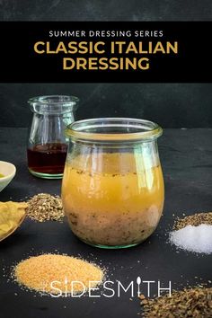 a jar filled with different types of dressings on top of a black countertop