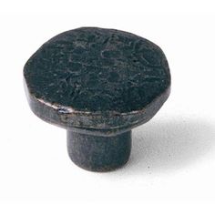 an old black knob on a white background