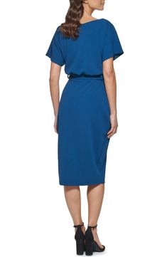 A minimalistic, ultra-refined dress framed by an envelope hemline and short sleeves is styled with a defining waist belt. Bateau neck Short sleeves 95% polyester, 5% spandex Hand wash, dry flat Imported Model stats: 5'10" height, 32" bust, 25" waist, 36" hip. Model is wearing size 4. Casual Blue Knee-length Wrap Dress, Blue Knee-length Wrap Dress For Work, Spring Knee-length Viscose Wrap Dress, Blue Belted Button-up Dress, Blue Relaxed Fit Button-up Dress, Bateau Neck, Blouson Dress, Waist Belt, Teal Blue