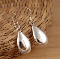 This is solid 925 Sterling Silver plain earrings.  925 Stamped. Approx. measures:         drop/length : 38mm          teardrop size: 23 x 13mm  Approx. weight: 5.9gr. Presented in gift box.     Thank you for looking! Plain Earrings, Earring Gifts, Solid 925 Sterling Silver, Sterling Silber, Jewelry Earrings Dangle, Dangle Drop Earrings, Dangle Earrings, Etsy Accessories, Gift Box