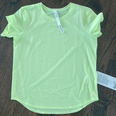 Run And Train Tee. New With Tags. Neon Yellow/Green. Reflective Details, Four Way Stretch And Sweat-Wicking. Size 6 Spring Gym T-shirt With Stretch, Yellow Moisture-wicking Stretch Tops, Stretch Yellow Tops With Moisture-wicking, Yellow Athleisure Tops For Sports, Green Go-dry Tops For Light Exercise, Green Sporty Top For Light Exercise, Yellow Gym Top For Summer, Yellow Stretch Athleisure Top, Green Athleisure Tops For Light Exercise