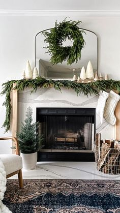 a living room filled with furniture and a fire place covered in greenery next to a fireplace