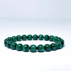 Our natural malachite bracelet is perfect for any outfit. A great accessory for yoga, meditation, and keeping the earth energies around you strong. The stone has been praised for centuries as a calming and peaceful gemstone, which may be why this beauty brings our moods to a happy place. A great accessory for yoga, meditation, and keeping the earth energies around you strong. Malachite is an important protection stone. Its beautiful texture and deep green color act as a shield against negative e Spiritual Malachite Beaded Bracelets For Healing, Spiritual Malachite Beaded Bracelet For Healing, Adjustable Malachite Spiritual Bracelet, Adjustable Spiritual Malachite Bracelet, Adjustable Spiritual Malachite Bracelets, Spiritual Malachite Bracelets As Gift, Spiritual Malachite Bracelet As A Gift, Spiritual Malachite Beaded Bracelets With Gemstone Beads, Spiritual Malachite Bracelet With Natural Stones