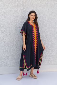 "This beautiful free size Kaftan has a unique presence to it. It's colorful and most importantly comfortable wear, light and soft and can be used on many occasions - home gatherings, dinners, or just in your home to feel comfortable. Fabric : 80% Egyptian Cotton and 20% Polyester Measurements : Free size. Fits up to 4XL. Also there is a belt that can be used to tighten the dress around the hips. Bust size : 67 inches Length : 57 inches **Note : The kaftan in the video is a different color of the Indigo Tunic Kaftan, Blue Embroidered Kaftan For Beach, Blue Embroidered Kaftan For Beach Cover-up, Traditional Kaftan With Geometric Embroidery For Vacation, Blue Folk Style Kaftan For Festivals, Blue Embroidered Folk Kaftan, Blue Bohemian Kaftan With Embroidered Border, Blue Kaftan For Eid Festival, Folk Style Tunic Kaftan For Beach Cover-up