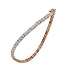 18k gold diamond curved bangle in 6.5 inches in length The sleek design of this diamond-encrusted wave bangle flatters every wrist. - 18K gold weighing 10 grams with 29 round diamonds totaling 1.80 carats Available in yellow, white, and rose gold. Please allow 3-4 weeks for delivery if item is not in stock. Item no. AB080 Diamond Bangle, Sleek Design, Yellow White, Round Diamonds, Gold Diamond, Bangle Bracelets, 18k Gold, Jewelry Bracelets, Bangles