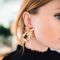 These earrings are a spring and holiday must. These oversize studs will have your outfit in full bloom. Available in both gold and silver. Flower-shaped Earrings For Spring Party, Chic Spring Flower Earrings For Pierced Ears, Drop Earrings For Spring Party, Glamorous Flower Drop Earrings For Pierced Ears, Glamorous Drop Flower Earrings For Pierced Ears, Glamorous Flower Drop Earrings, Gold Flower Earrings For Spring Party, Chic Rose Gold Hoop Earrings For Party, Chic Evening Flower Earrings