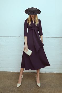 The Fontaine is a beautiful 1940s-inspired softly tailored silk dress, featuring classic lines and elegant proportions. Made from our signature, fluid Italian silk crepe, in a rich blackcurrant purple. With its narrow, elongated v-neckline, this dress elegantly frames the face while remaining demure enough for every occasion. The gentle A-line skirt is lined in tonal silk satin, skimming the hips, falling in soft, fluid folds, and designed to fall to a graceful midi length. The Fontaine silhouet Suzannah London, Dress Elegantly, Wedding Guest Outfit Winter, Winter Wedding Guest Dress, Vintage Couture, Silk Midi Dress, Outfits With Hats, Formal Outfit, Midi Length Dress