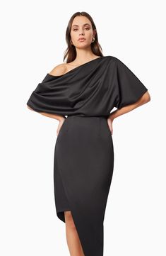 A drapey one-shoulder bodice tops this smooth satin dress punctuated with a sleek asymmetric hem. 42" to 54" length (size Medium) Hidden side-zip closure One-shoulder neck Elbow-length sleeves Partially lined 97% polyester, 3% spandex Hand wash, line dry Imported