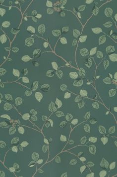 a green wallpaper with leaves on it