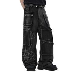 Black wide-leg jeans with a dramatic oversized silhouette. Features multiple large cargo pockets with snap button closures, adding a utilitarian edge. The jeans have a unique distressed design with white embroidered barbed wire patterns across the legs, creating an edgy, punk-inspired look. The denim has a worn, faded black wash for a vintage feel. The extreme wide-leg cut and long length result in a floor-sweeping hem. Combines avant-garde styling with gothic and industrial aesthetics for a bol Punk Style Wide Leg Jeans, Y2k Cargo Jeans With Belt Loops For Streetwear, Y2k Distressed Cargo Jeans For Streetwear, Baggy Punk Cargo Jeans For Streetwear, Distressed Baggy Wide Leg Cargo Pants, Baggy Distressed Wide Leg Cargo Pants, Edgy Wide Leg Cargo Jeans With Multiple Pockets, Baggy Wide Leg Distressed Cargo Pants, Grunge Streetwear Cargo Jeans With Multiple Pockets