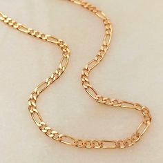 "∙ G O L D ∙ F I G A R O ∙ C N A I N ∙ N E C K L A C E   24''   18K Gold plated over solid sterling silver.  Gifts for him. Birthday gifts. Valentine's day gift idea. Best gift. ✓ Figaro necklace men that are perfect for spoiling yourself or gifting. ✓ Long figaro chain necklace It will be the right choice for your daily use. Style * Mens jewelry * Gold figaro chain * Silver figaro chain * Figaro chain men * Cuban link necklace *  Necklace men * Boyfriend gifts * Cuban necklace * P R O D U C T - Gold Polished Chain Necklace For Gift, Gold Chain Necklace With Polished Finish As Gift, Classic Figaro Chain Jewelry As Gift, Classic Figaro Chain Jewelry Gift, Rose Gold Figaro Chain Jewelry For Gift, Rose Gold Plated Figaro Chain Jewelry, Rose Gold Figaro Chain Jewelry In Gold Plated, Rose Gold Plated Jewelry With Figaro Chain, Rose Gold-plated Jewelry With Figaro Chain