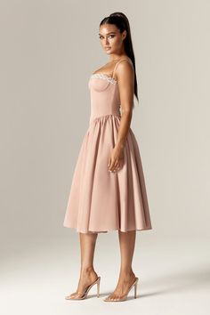 Katherine, is THE dress for romantic date nights and has the prettiest silhouette and it’s your perfect for all seasons.The bodice is fitted with the waist cinching corset bones and has a pretty sweetheart neckline with rhinestone embellishment on the bust. Fitted with tulle to hold the shape, we love how the voluminous midi skirt is gently gathered to flatter your legs.'Katherine' has pockets and is fully lined for comfort It zips to the back for easy on and looks ultra feminine styled with cle Ultra Feminine Style, Corset Boning, Midi Sundress, Ultra Feminine, Romantic Date, Dress Dusty, Romantic Dates, Cinched Waist, Dusty Pink