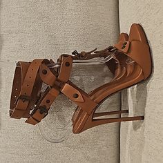 Authentic Giuseppi Zanotti Wrap Around Strappy Sandals Heels. Color: Brown. Size: 36.5. Preowned Never Used Only Tried On. From 2014. No Box Or Dustbag. All Items From My Personal Collection. From A Smoke Free Pet Free Home. Same Day/Next Day Shipping. No Trades. Thanks For Looking. Tags: Zanotti, Zanotti Heels, Zanotti Shoes, Giuseppi Zanotti, Brown Heels, Strappy Heels, Sandals, Strappy Sandals, Brown Sandals, Brown High Heels, Brown Shoes, Brown Leather Shoes, Brown Leather Heels, Zanotti Sal Calf Leather High Heels, High Heel Sandals With Reinforced Heel For Office, Designer Heels With Ankle Strap And Sculpted Heel, Designer Heels With Sculpted Heel And Ankle Strap, Almond Toe Calf Leather Sandals For Party, Designer Heels With Ankle Strap And Buckle Closure, Designer Heels With Ankle Strap And Padded Heel, Designer Heels With Padded Heel And Ankle Strap, Designer Heels With Ankle And Heel Strap